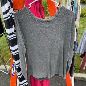 Woman’s sweater, lightly worn